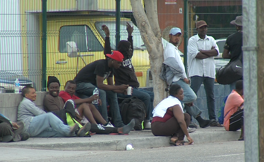 Haitian migrants mingle with Mexican migrants in Tijuana, Sept. 19, 2016. 