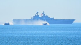 Marines perform in a demonstration with hovercraft and the amphibious assault ship USS Boxer during activities to mark the Marine Corps' 250th anniversary, Oct 18, 2025, on Marine Corps Base Camp Pendleton in Camp Pendleton, Calif.