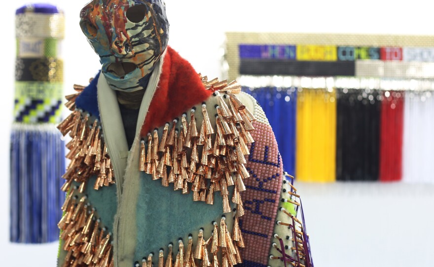 Jeffrey Gibson's project <em>What We Want, What We Need</em> stands on display in Hong Kong in 2015.