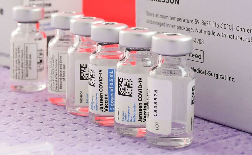 Bottles of the single-dose Johnson & Johnson COVID-19 vaccine awaited transfer into syringes for administering in Los Angeles last month.