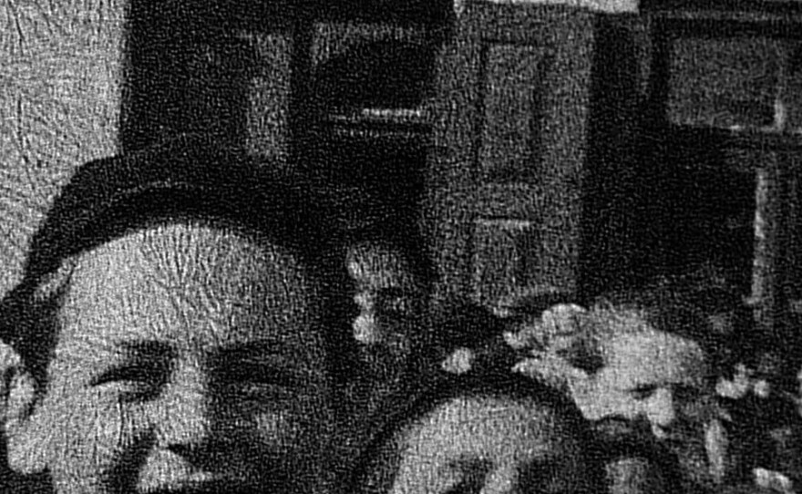 In a still from the 1938 film footage, 13-year-old Morris Chandler appears on the left, among other town children.