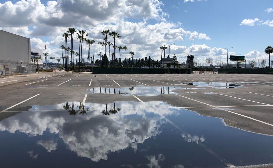An empty parking lot outside the San Diego International Airport on Mar. 27, 2020.
