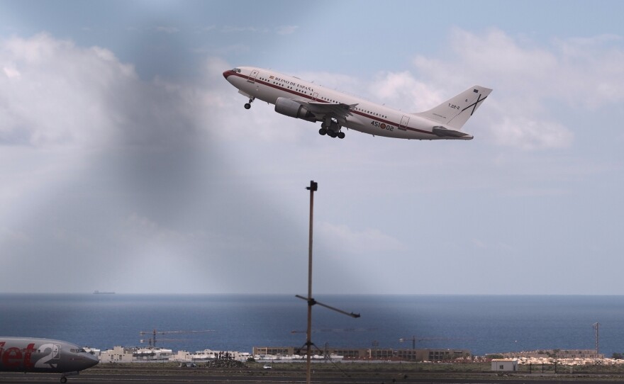 A Spanish government plane takes off with passengers from the hantavirus-stricken cruise ship MV Hondius at the airport in Tenerife, Canary Islands, Spain, Sunday, May 10, 2026.