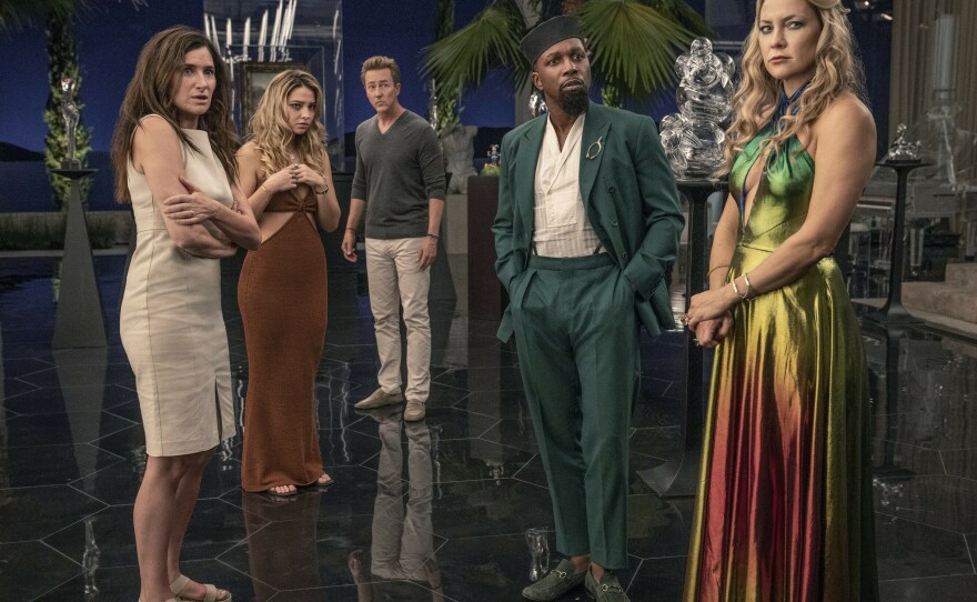 Kathryn Hahn as Claire, Madelyn Cline as Whiskey, Edward Norton as Miles, Leslie Odom Jr. as Lionel, and Kate Hudson as Birdie in <em>Glass Onion: A Knives Out Mystery.</em>