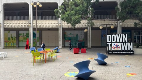 People walk through the public plaza outside Golden Hall in downtown San Diego on Jan. 21, 2026.