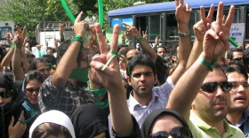 Iranian opposition supporters, wearing green accessories, take part in the Quds (Jerusalem) Day rally in Tehran on September 18, 2009.