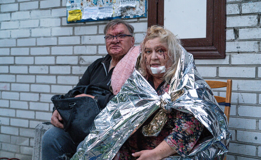 The survivors of the Russian attack wait in Kyiv, Ukraine.