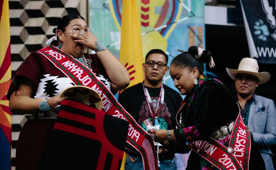 Montoya, Miss Navajo Nation 2018-2019, has her sash pinned on by Littleben, the outgoing Miss Navajo Nation. Montoya is the first Miss Navajo in 10 years from the Eastern Agency of the Navajo Nation and represents their unique stories, tradition and dialect.