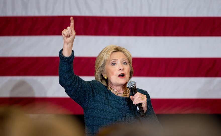 Democratic presidential candidate Hillary Clinton speaks at a rally in Marshalltown, Iowa. Clinton is narrowly ahead of Sanders, but within the margin of error in the final Iowa poll.