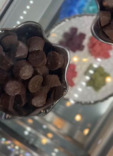 Edibles are shown inside a glass case at HerbNJoy in Chula Vista on April 20, 2023.