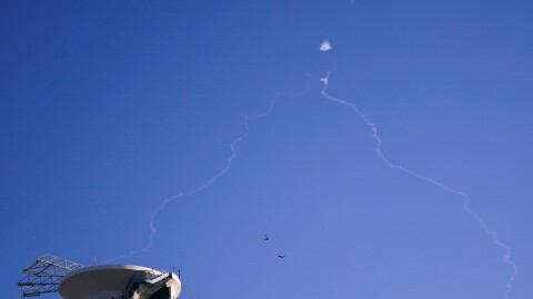 Israel's Iron Dome anti-missile system fires to intercept as air raid sirens sound in Tel Aviv, on Oct. 23, 2024.