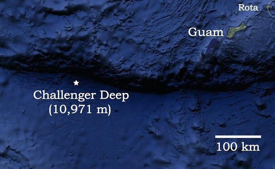 A map shows the location of the Pacific Ocean's Challenger Deep, in relation to Guam.