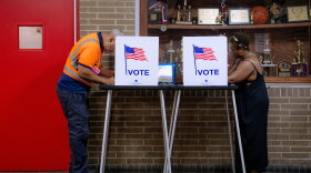 People vote in the primary election at Northwestern High School in Detroit, Tuesday.