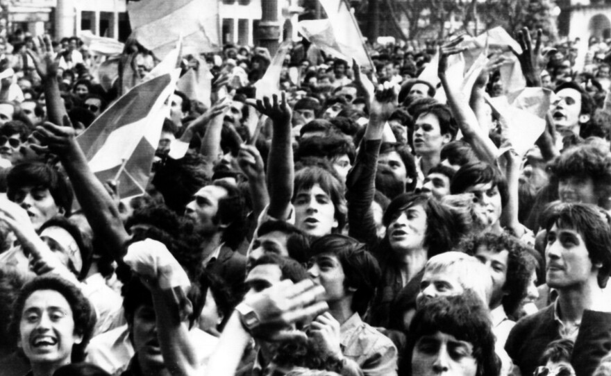 People in Buenos Aires celebrate after reports that Argentina's troops landed on the Falkland Islands (las Malvinas) in April 1982.