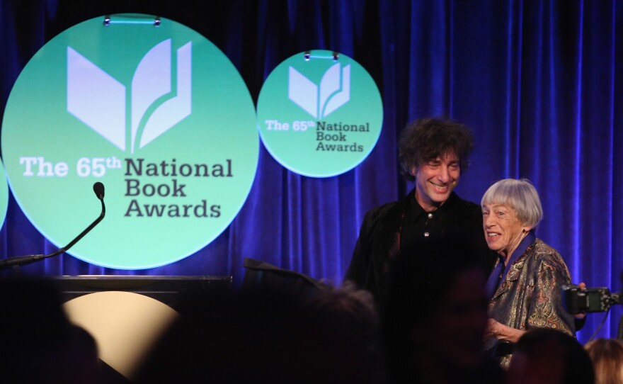 Neil Gaiman, left, and Ursula K. Le Guin attend the 2014 National Book Awards, where Le Guin was recognized, on Wednesday in New York City.