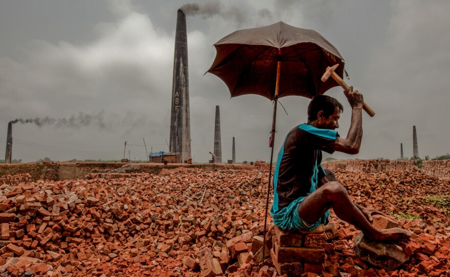 Breaking bricks is one of the lowest paying jobs in Bangladesh. This photo was shot at a brick kiln in the Dhaka District, home to the capital city of Dhaka.