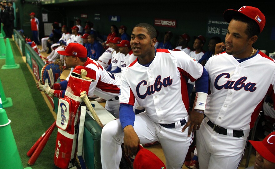 Cuba's team at the World Baseball Classic in Tokyo on March 8. More than 200 Cuban players have defected to the U.S. over the past two decades, and smugglers are increasingly involved in getting the players off the island, according to U.S. baseball agents.