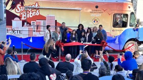 School principals and students help in cutting the ribbon for the new food truck sponsored by Intuit for learning how to run a business, San Diego, Calif., Feb. 27, 2024