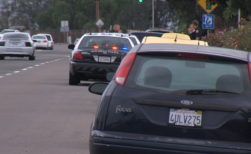 San Diego police officers pull over drivers in the Skyline neighborhood of San Diego on June 9, 2015.