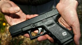 A file photo of a Glock 19, the type of weapon that authorities say was used in the Jan. 8 shootings in Tucson.