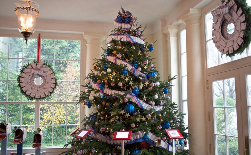 The White House is decked out with 62 Christmas trees and more than 70,000 ornaments. The decorations on the East Landing include garlands made of airmail envelops, mailboxes and iPad stations that allow visitors to send messages to military service members.
