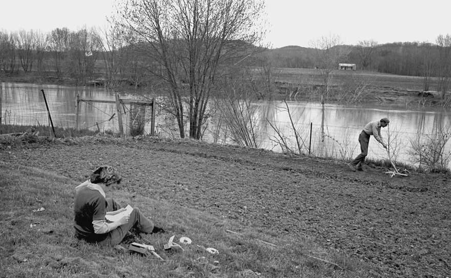 Tanya and Wendell Berry working in the field