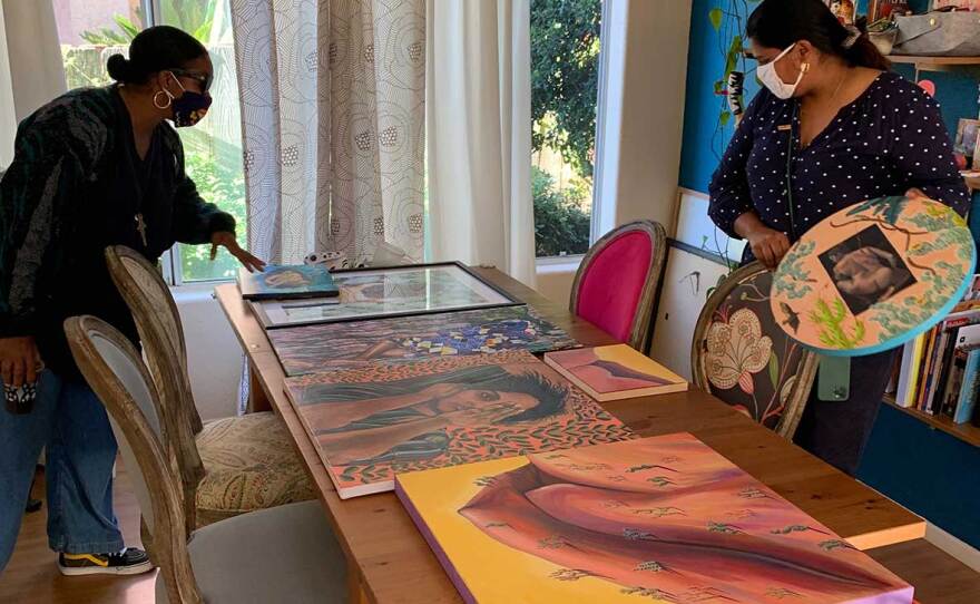 HSCC cofounder Dinah Poellnitz participates in a studio visit with of one of their 2021 artists, Chitra Gopalakrishnan in an undated photo.