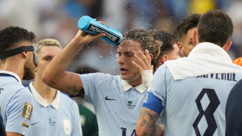 Uruguay's Agustin Canobbio cools off during a hydration break in a World Cup soccer match against Saudi Arabia in Miami Gardens, Fla., on June 15, 2026. Dangerously hot, humid weather in the area prompted an extreme heat warning from the National Weather Service earlier in the day.