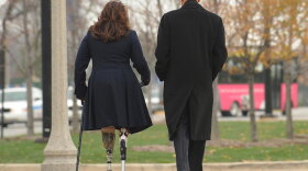 Barack Obama walks with Iraqi war veteran Tammy Duckworth after the two placed a wreath at The Bronze Soldiers Memorial in Chicago on Veterans Day last year. Duckworth, now assistant secretary at the Department of Veterans Affairs, says a controversial VA guide on end-of-life decisions continues to undergo revisions.