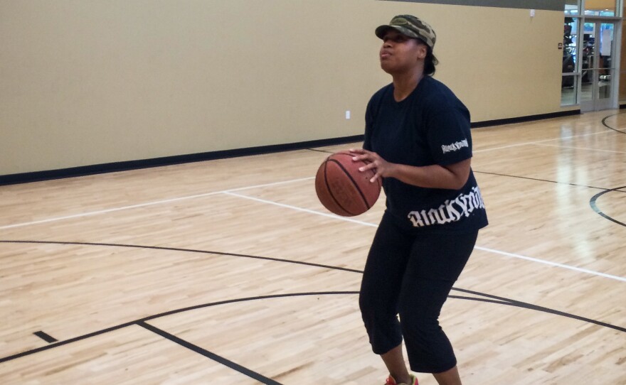 Nikia Smith Robert stopped playing basketball when she was pregnant with her first child, then returned to the game after the baby was born in 2009.