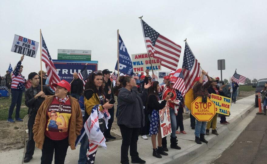 Supporters of President Donald Trump rally near the U.S.-Mexico border ahead of Trump's visit to San Diego, March 13, 2018.
