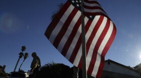 A voter leaves a polling station after casting his ballot in San Diego, Nov. 4, 2014.
