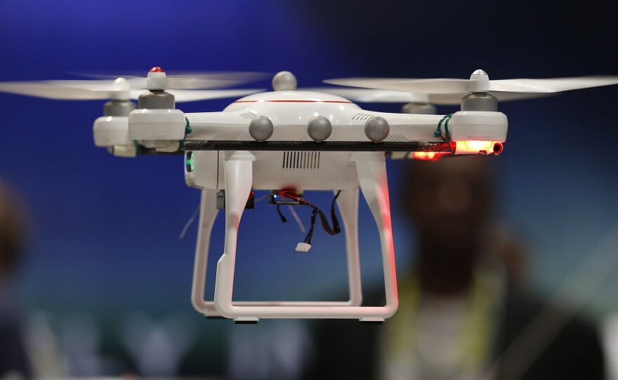 Drones fly at the International CES held last month in Las Vegas. In Oklahoma, a state senator has introduced a bill that would allow land-owners to shoot a drone down if it's above their property.