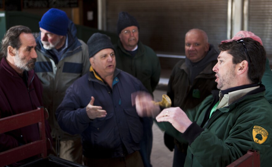 Ray Bukowski (far right), manager of Island Beach State Park, organizes members of the New Jersey Beach Buggy Association.