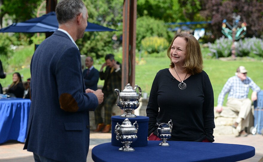 Sebastian Clarke (left) appraises a William Thomson silver coffee service, ca. 1830, in Boise, Idaho.