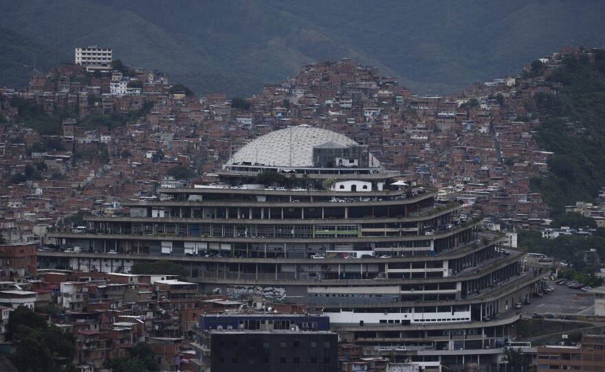 Venezuela's National Intelligence Service headquarters, known as El Helicoide, stands in front of La Cota 905 neighborhood in Caracas, Venezuela, Sept. 12, 2022.