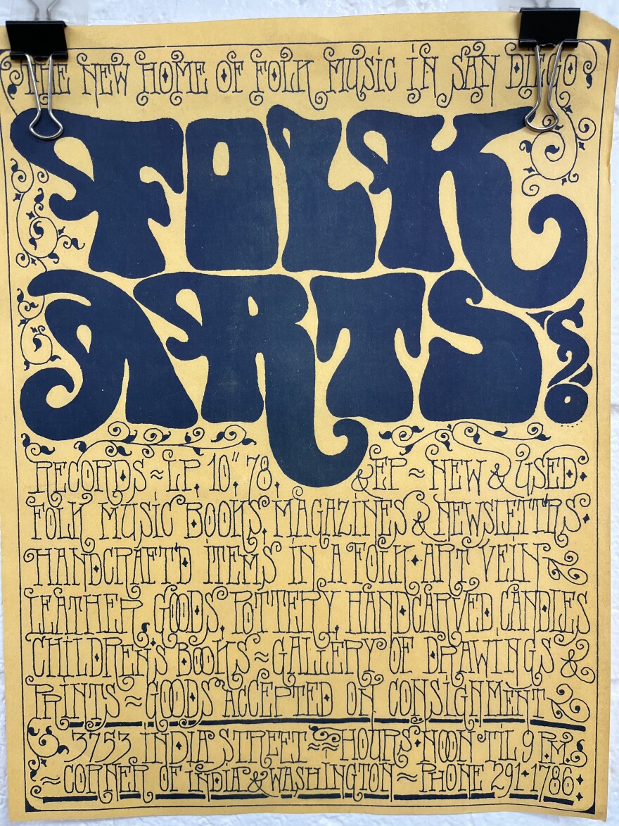 The poster announcing the opening of Folk Arts Rare Records in 1967 is shown. At the shop's current main location in City Heights, the walls are filled with old posters, newspaper clippings and photos — a sort of museum of music history.