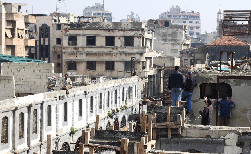 The fighting in Homs has been largely over since 2014 — government forces and their allies crushed the rebels and negotiated surrenders. Now, the United Nations Development Programme is working to rehabilitate the old city. Here, men work on the old souk.