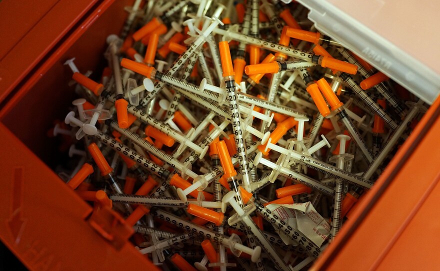 Used syringes rest in a pile at a needle exchange clinic in St. Johnsbury, Vt. The CDC says needle exchanges like this one, where users can obtain clean needles, help reduce the rates of death and transmission among those suffering from hepatitis C.