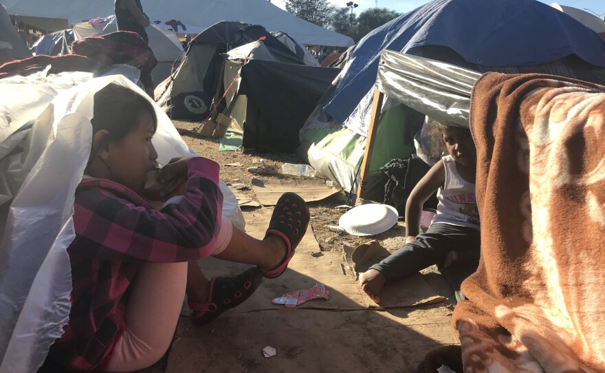 Migrant children rest at the Tijuana sports facility Benito Juarez, Nov. 27, 2018.