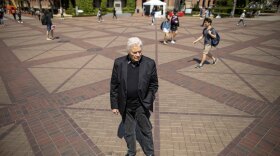 George Shannon, pictured in this undated photo,  stands on the campus of USC, where he earned his master’s degree and PhD in gerontology, and where he now works an instructional associate professor.