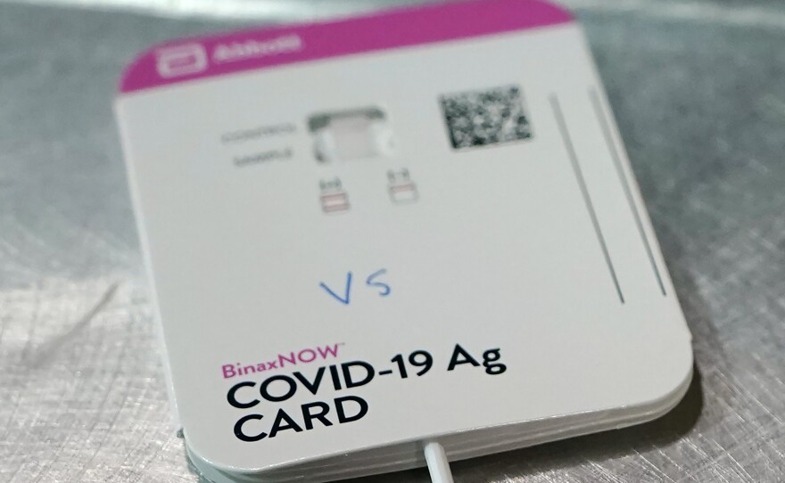 Abbott's BinaxNOW rapid COVID-19 test is seen in the photo. The Food and Drug Administration authorized Abbott's BinaxNow and Quidel's QuickVue tests to be sold without a prescription for consumers who want to test themselves repeatedly at home.