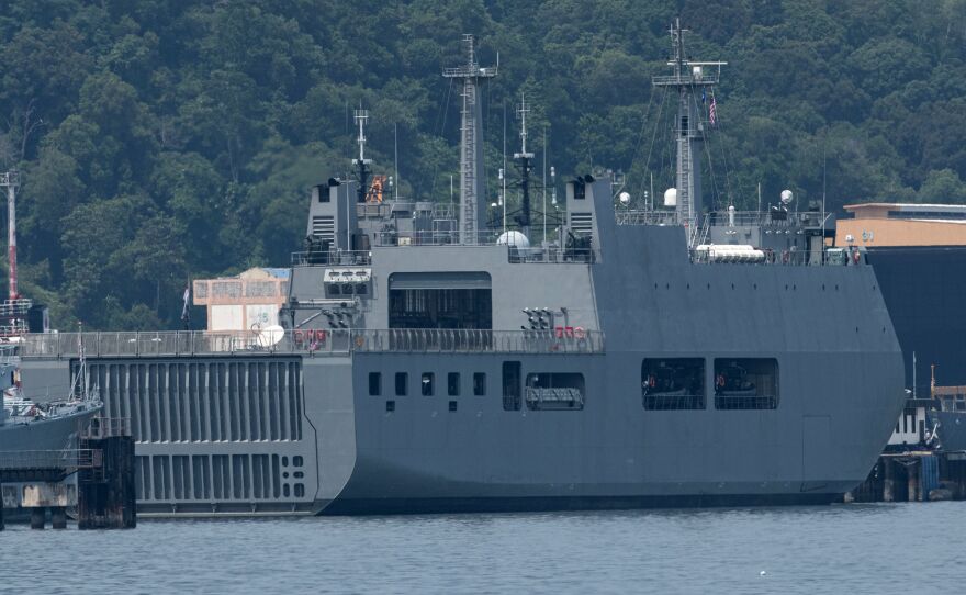 Myanmar vessel UMS Moattama, which was sent to return Myanmar migrants from Malaysia, is seen docked at a jetty outside Kuala Lumpur on Monday.