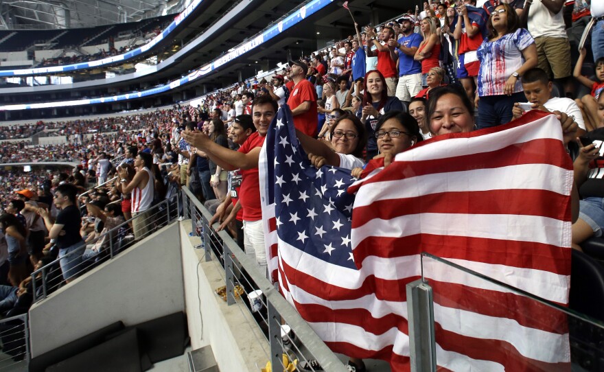 Fan cheer on the U.S. during a World Cup watch party in 2014 at AT&T Stadium, in Arlington, Texas. The arena is among those in contention to host matches during the 2026 World Cup.