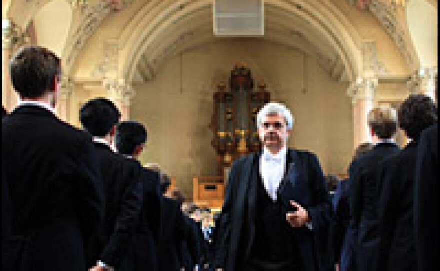 The boys of Eton College stand as headmaster Tony Little leaves morning assembly in September 2007. Little says the school, like the country, has been completely transformed in recent years.