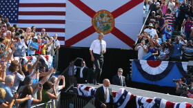 U.S. President Barack Obama walks on stage during a campaign rally at the Delray Beach Tennis Center on October 23, 2012 in Delray Beach, Florida.