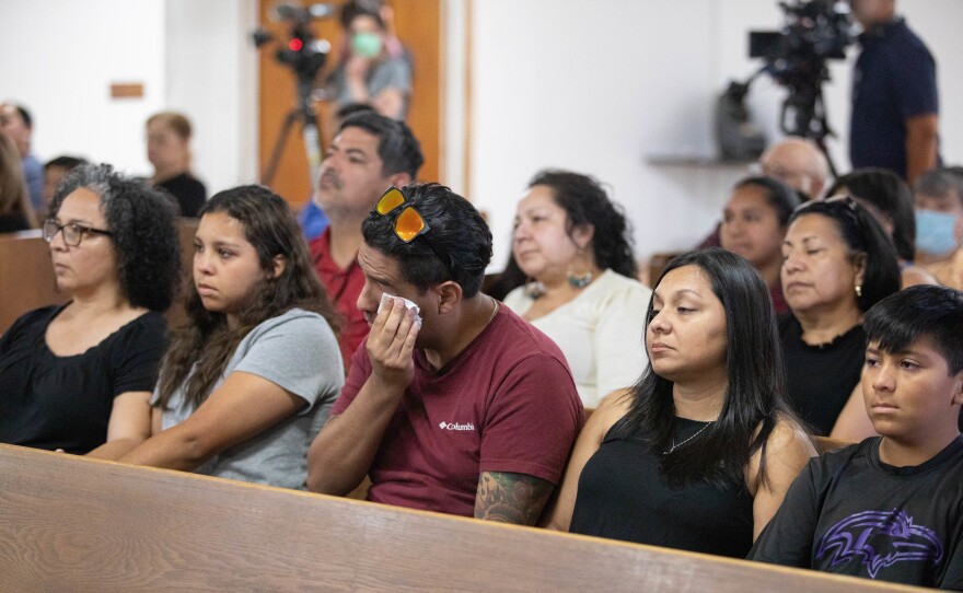 Church members mourn at Primera Iglesia Bautista in Uvalde on Thursday.