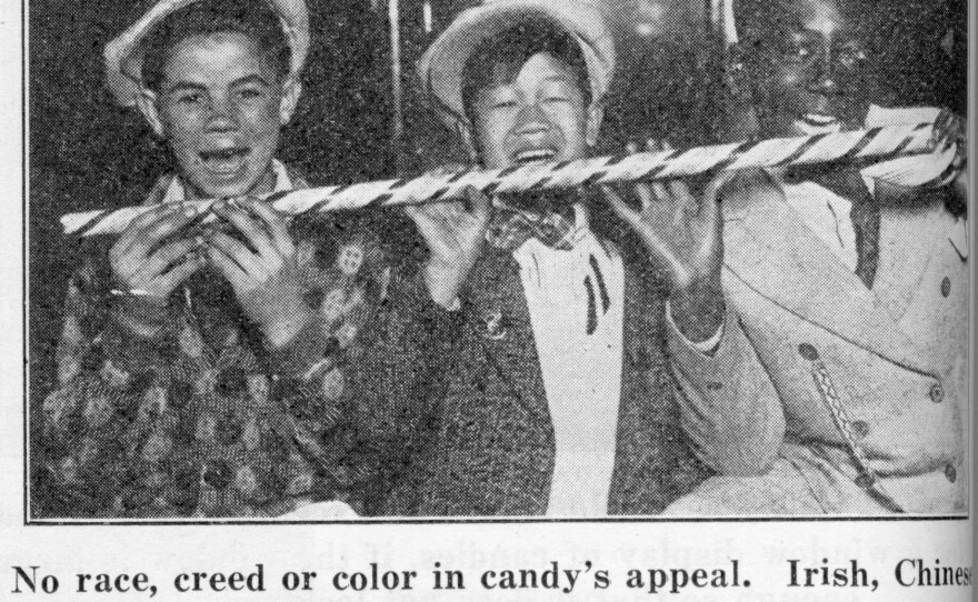 An ad of the era features a trio of "Irish, Chinese and Negro lads" chomping on a long peppermint cane. The image was a direct reference to pictures of barefoot black and Caribbean children sucking on sugarcane, which were common in the 1900s.