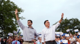 Republican presidential candidate Mitt Romney (right) and running mate Rep. Paul Ryan of Wisconsin greet supporters during a homecoming campaign rally Sunday in Waukesha, Wis.
