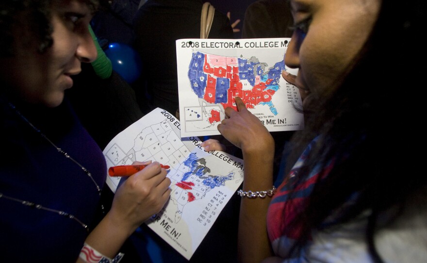 Rakeda Leaks (right) and Candice Williams fill out Electoral College maps on election night 2008.